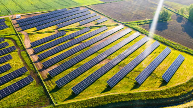 Solar PV farm on fields in the spring